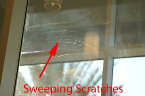 cleaning scratched low e glass